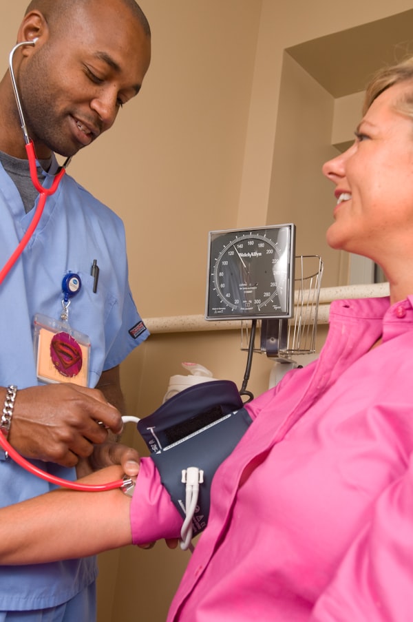 Doctor consulting with patient at community health center